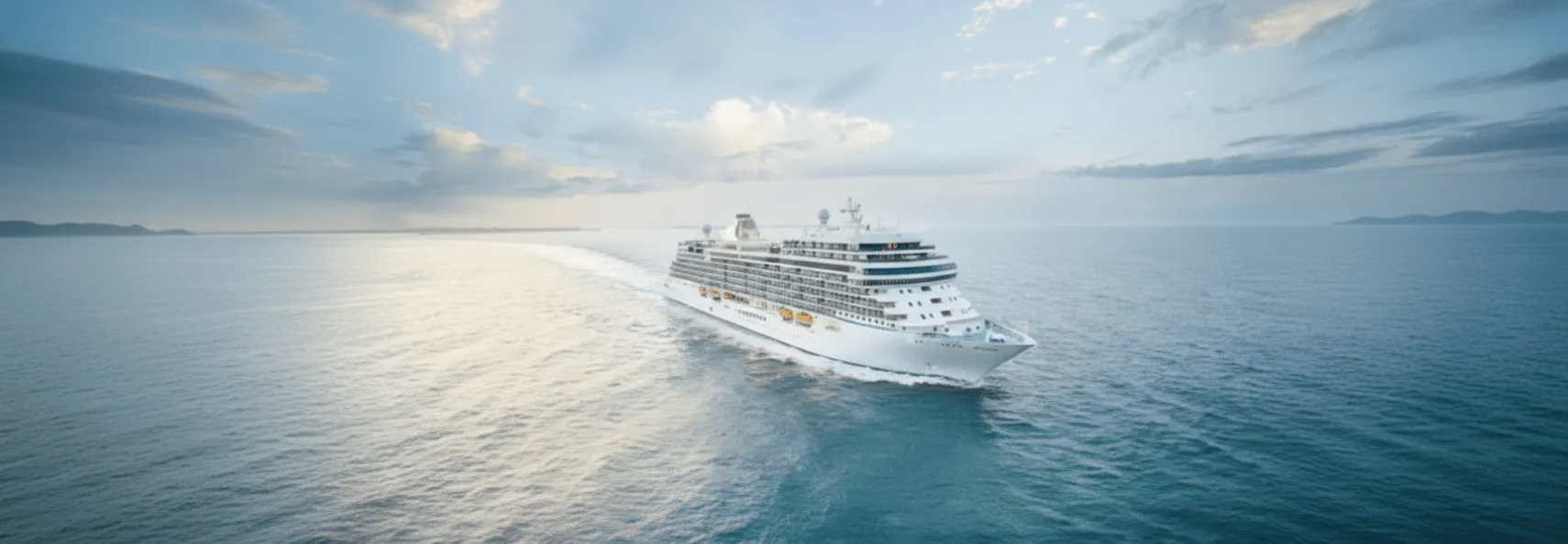 The Essential Cruise Shop's expert guide to Regent Seven Seas Cruises, featuring one of their signature cruise ships.