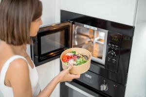 Discover the convenience and joy of cooking with built-in integrated microwave ovens