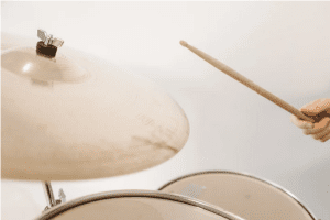 The crucial rhythmic foundation and musical cohesion exemplified by the role of a drummer in a band: Keeping Time