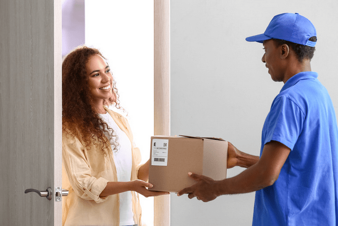 delivery person handing off package
