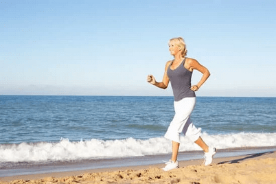 woman running on beach