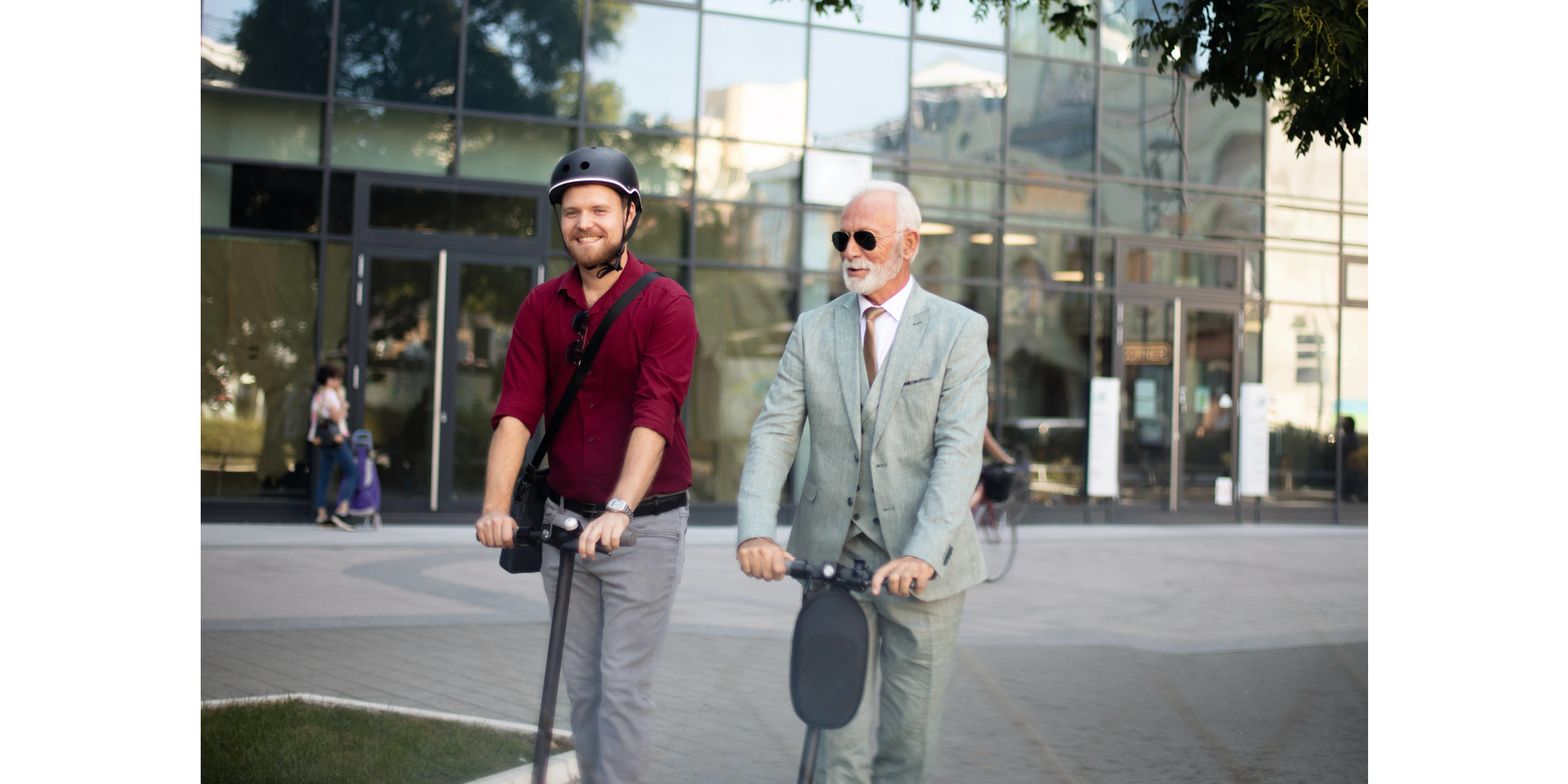 two men on scooters