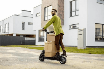 man on scooter