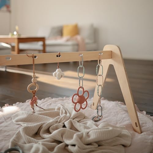 mushie Baby Silicone Daisy Rattle Teether Toy