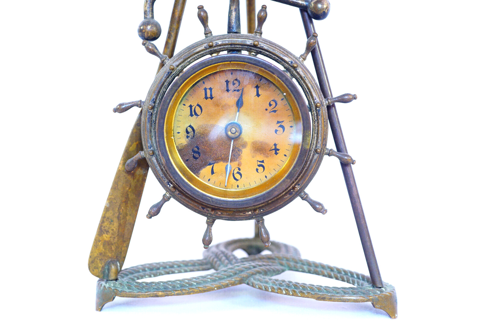 Ansonia Nautical Clock Sculpture with Boat Wheel Flag