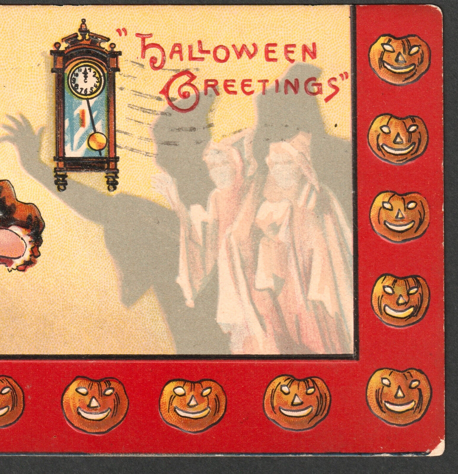 Vintage Halloween postcard with ghost, mirror, and lady