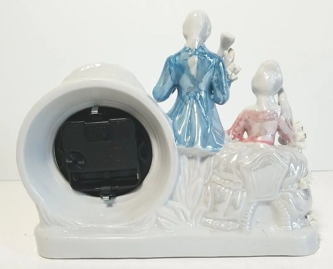 Old-Fashioned Porcelain Quartz Clock with 17th Century Couple