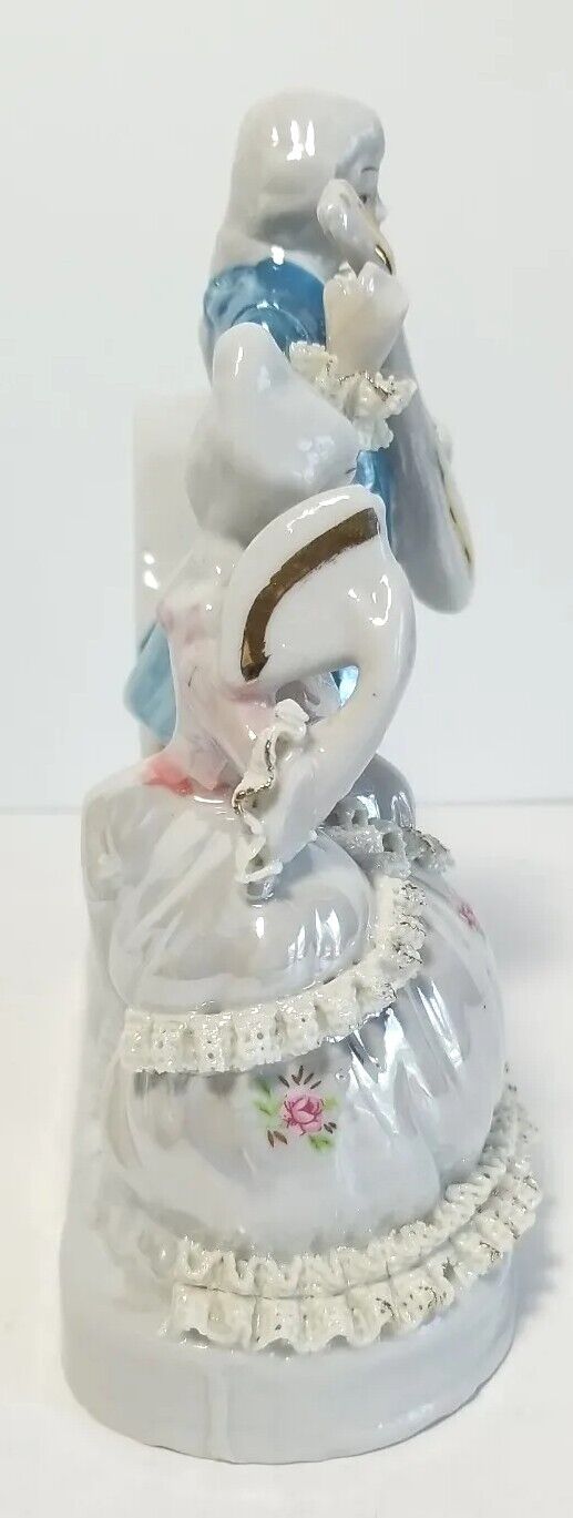 Old-Fashioned Porcelain Quartz Clock with 17th Century Couple