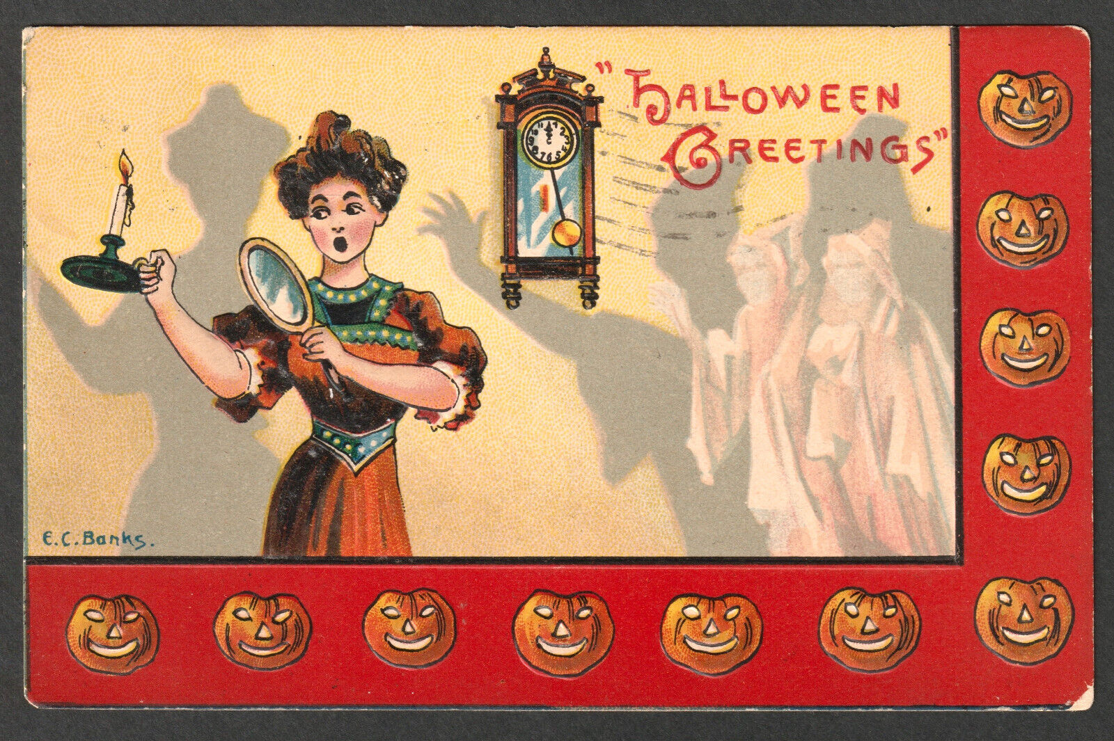 Vintage Halloween postcard with ghost, mirror, and lady