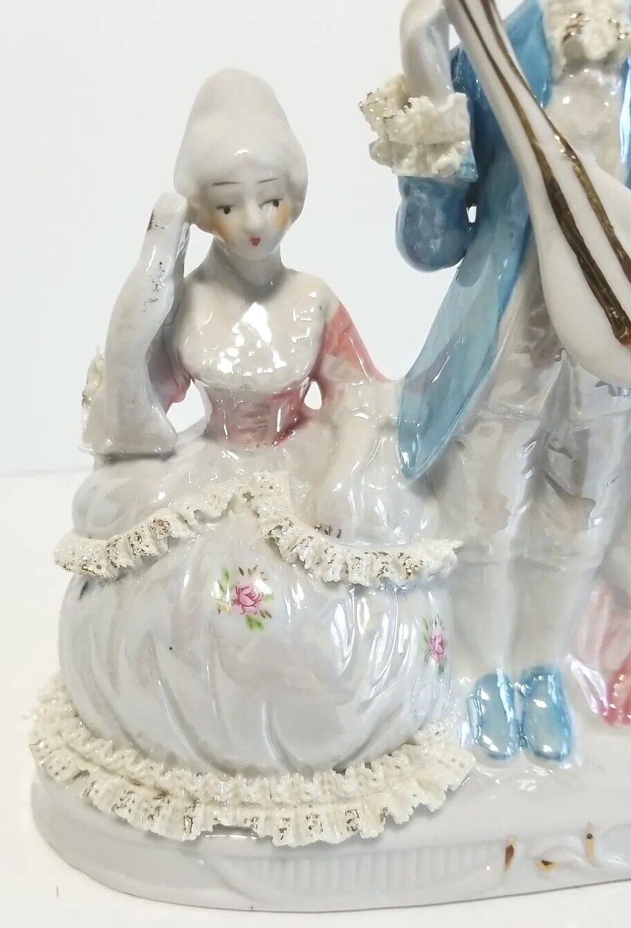 Old-Fashioned Porcelain Quartz Clock with 17th Century Couple