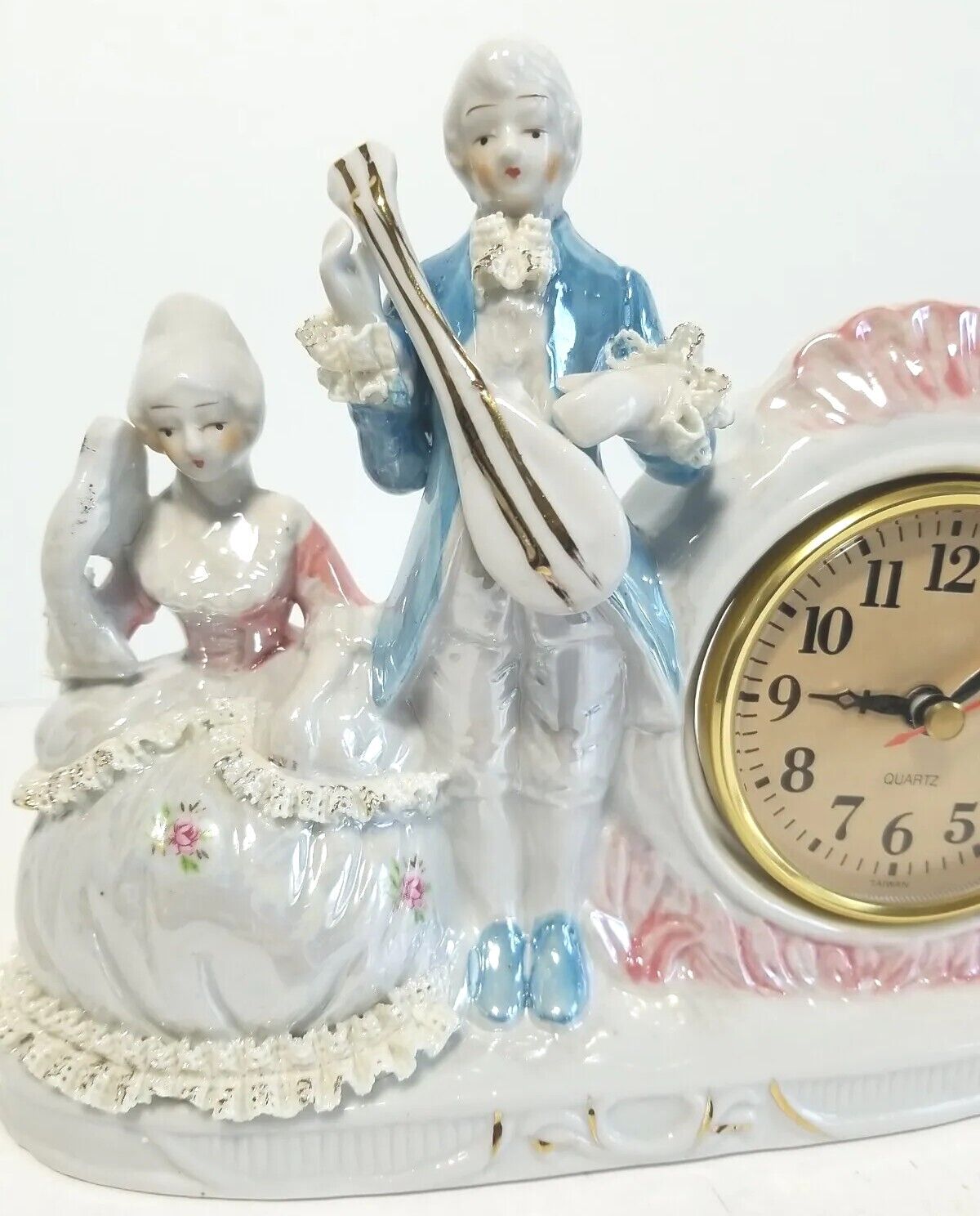Old-Fashioned Porcelain Quartz Clock with 17th Century Couple
