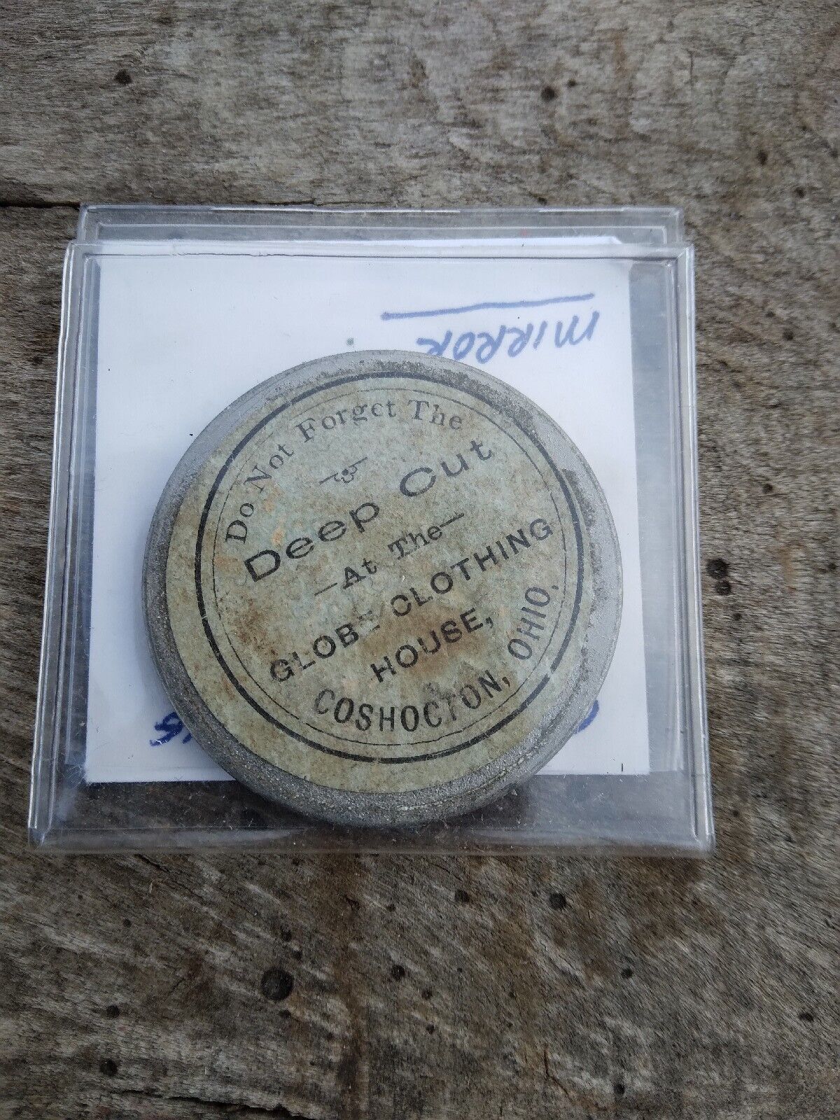 Vintage advertising pocket mirror from 1800s Globe Clothing House