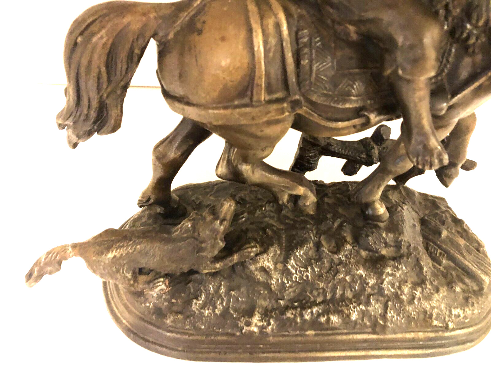 Vintage metal sculpture of Boy on Horse with Dog