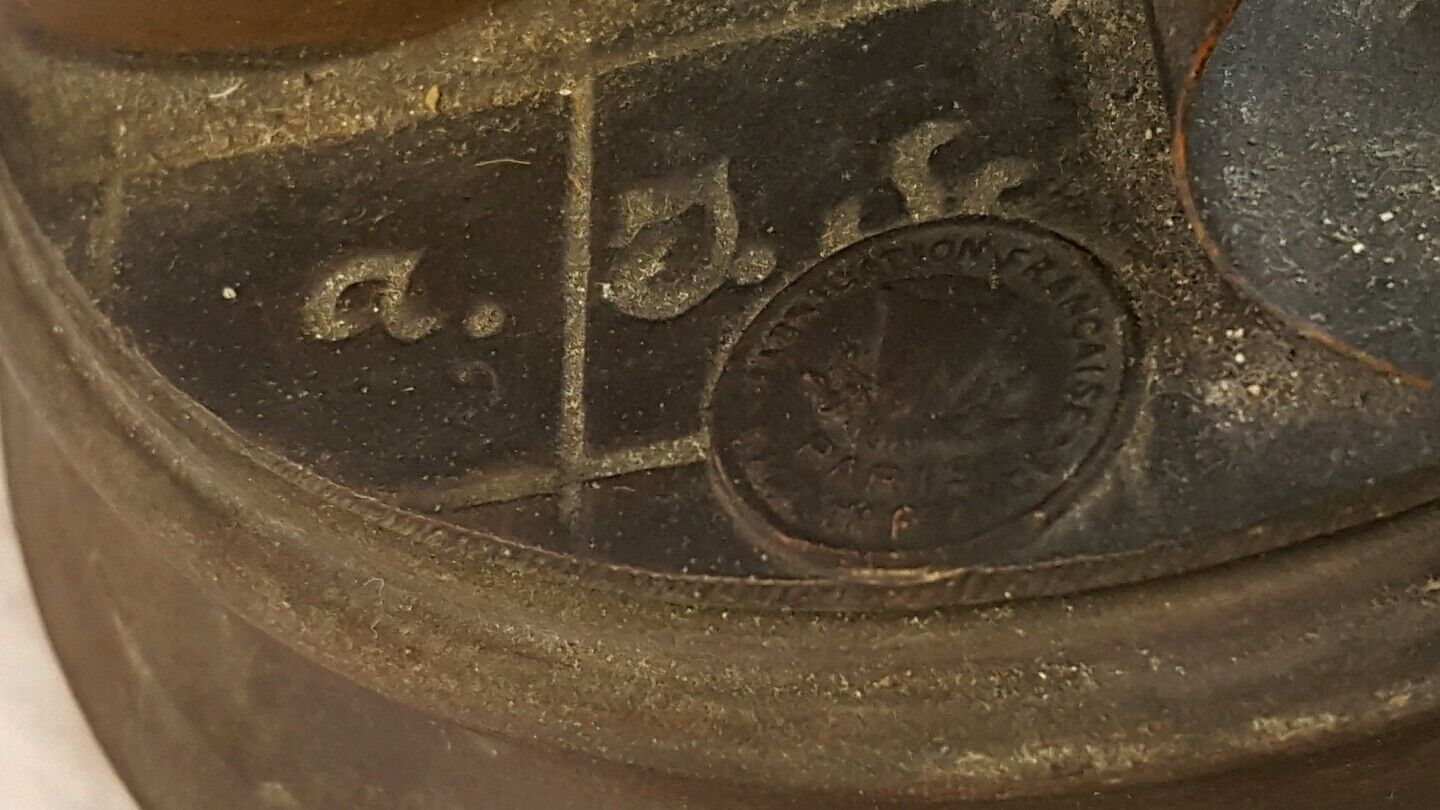 Signed A. J. Scotte "Lulli" Cast Metal Boy