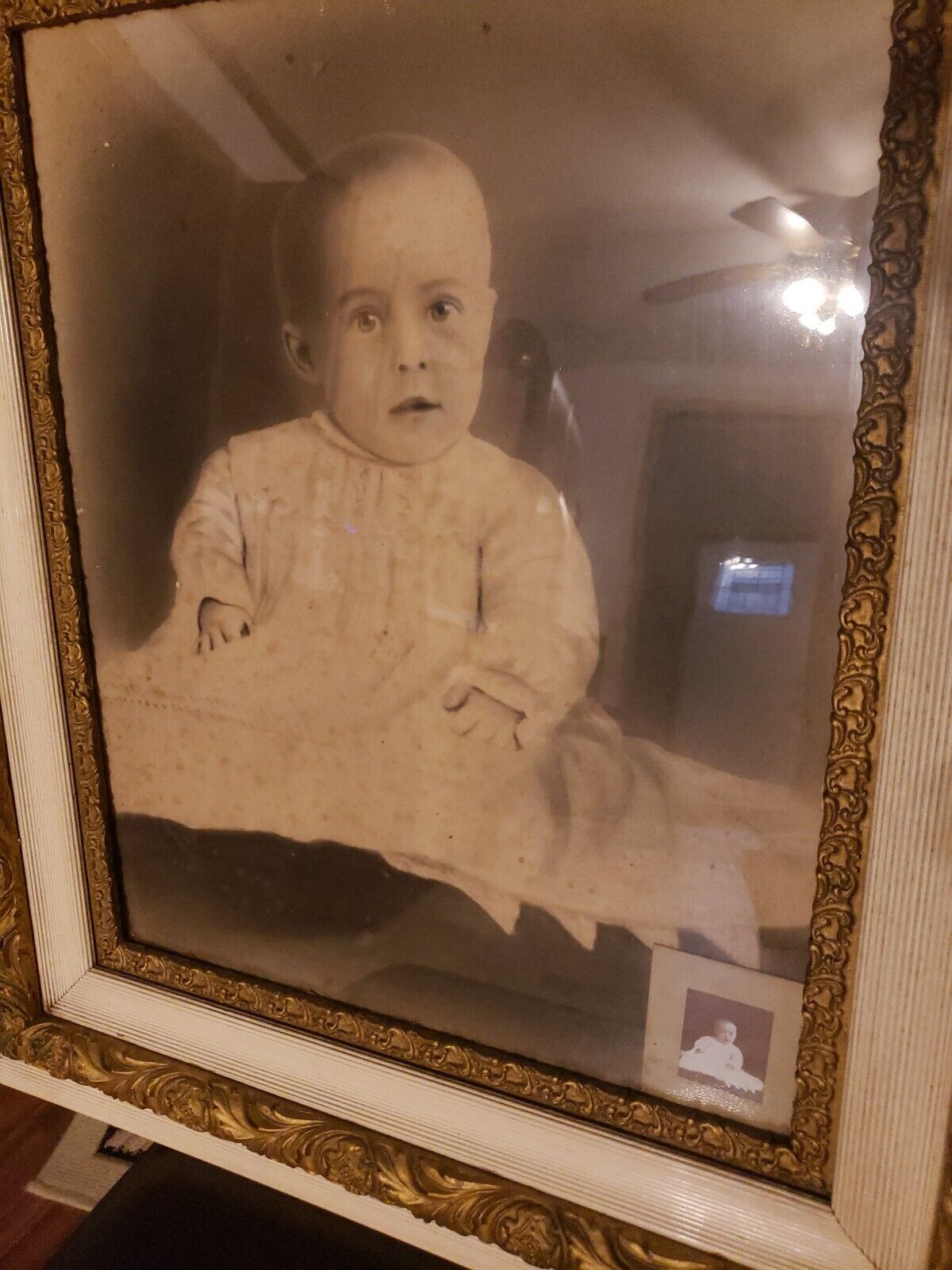Antique charcoal painting of child with small print