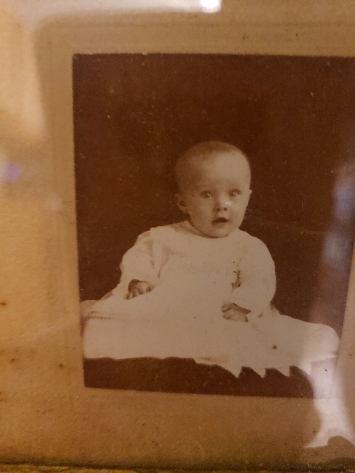Antique charcoal painting of child with small print