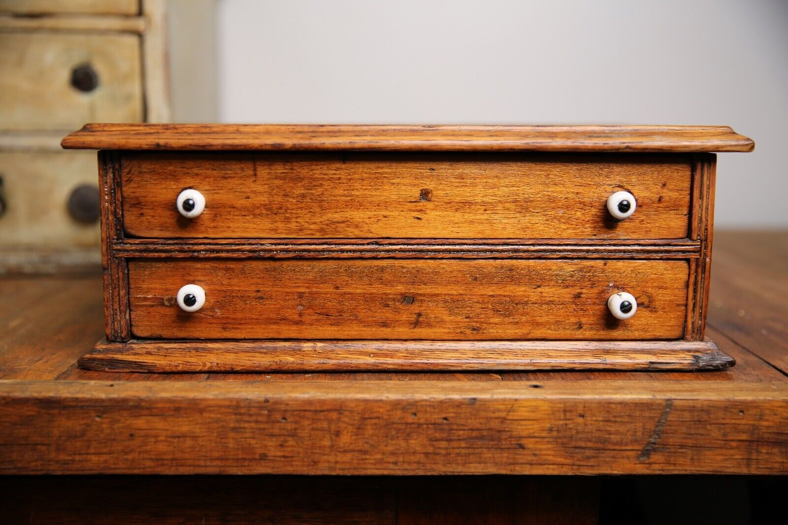 Antique apothecary drawer with porcelain knobs