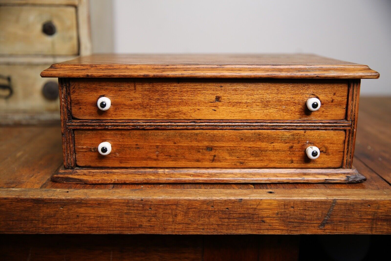 Antique apothecary drawer with porcelain knobs