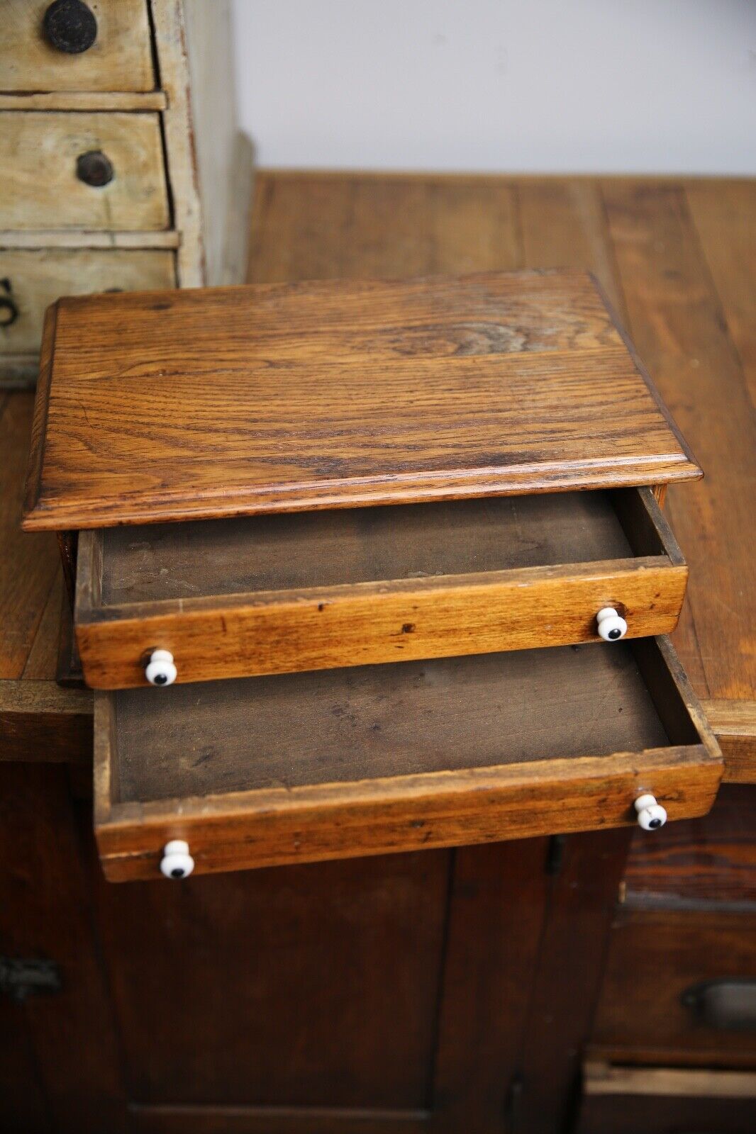 Antique apothecary drawer with porcelain knobs