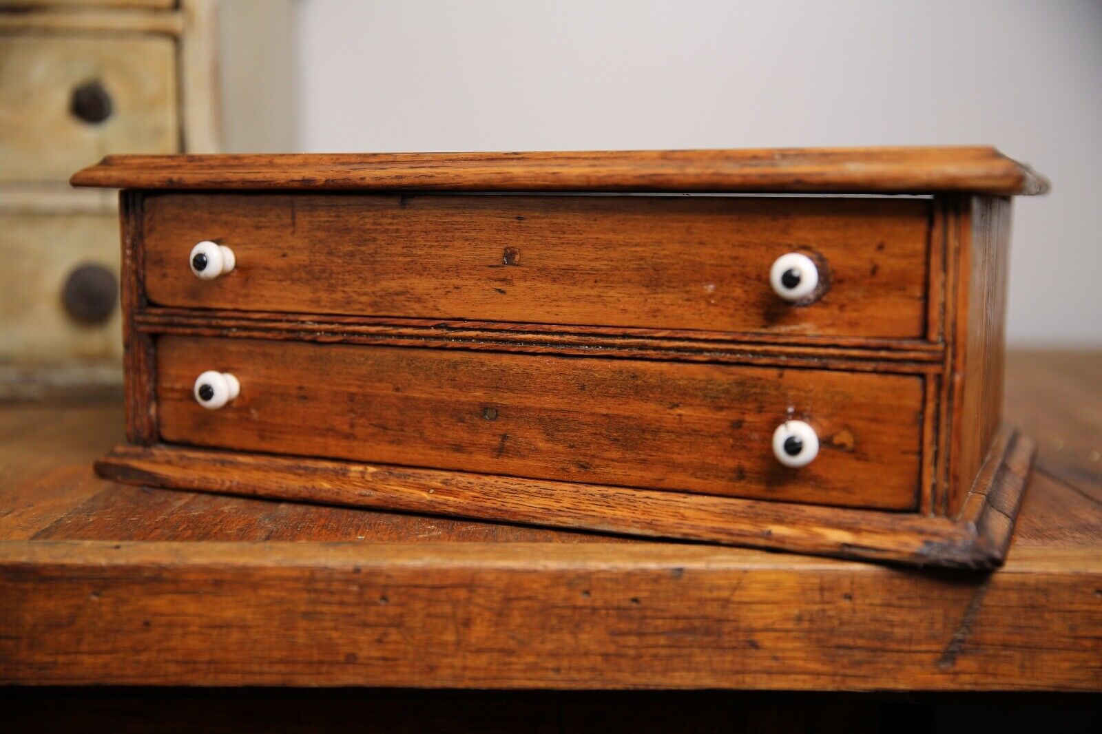 Antique apothecary drawer with porcelain knobs