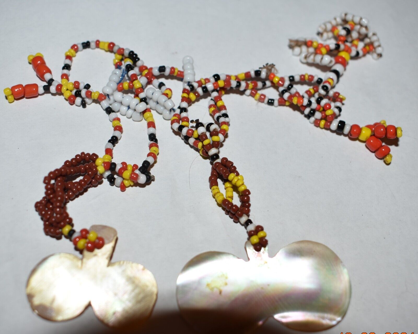 GADDANG SHELL BEAD EARRINGS, 1900S 4-5"