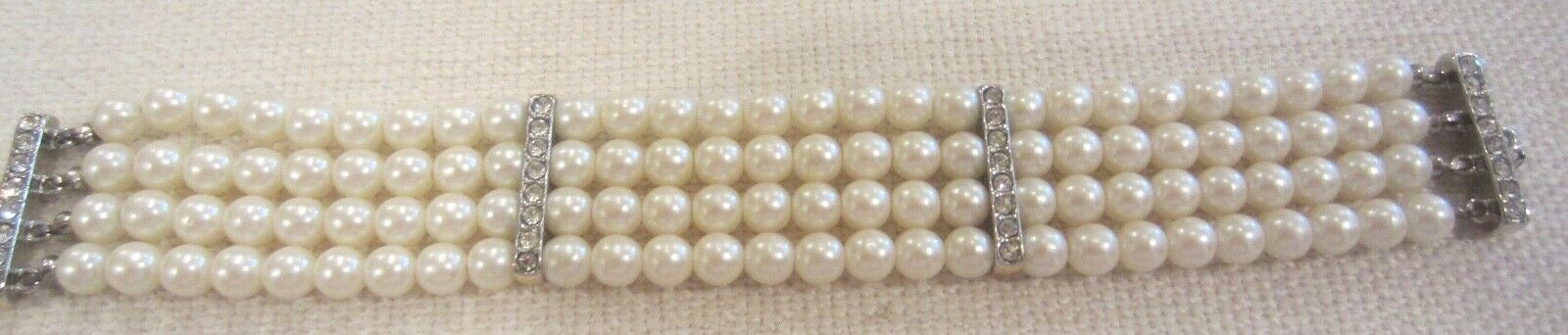 Vintage 4 strand pearl bracelet with rhinestones. 1900s Mid century