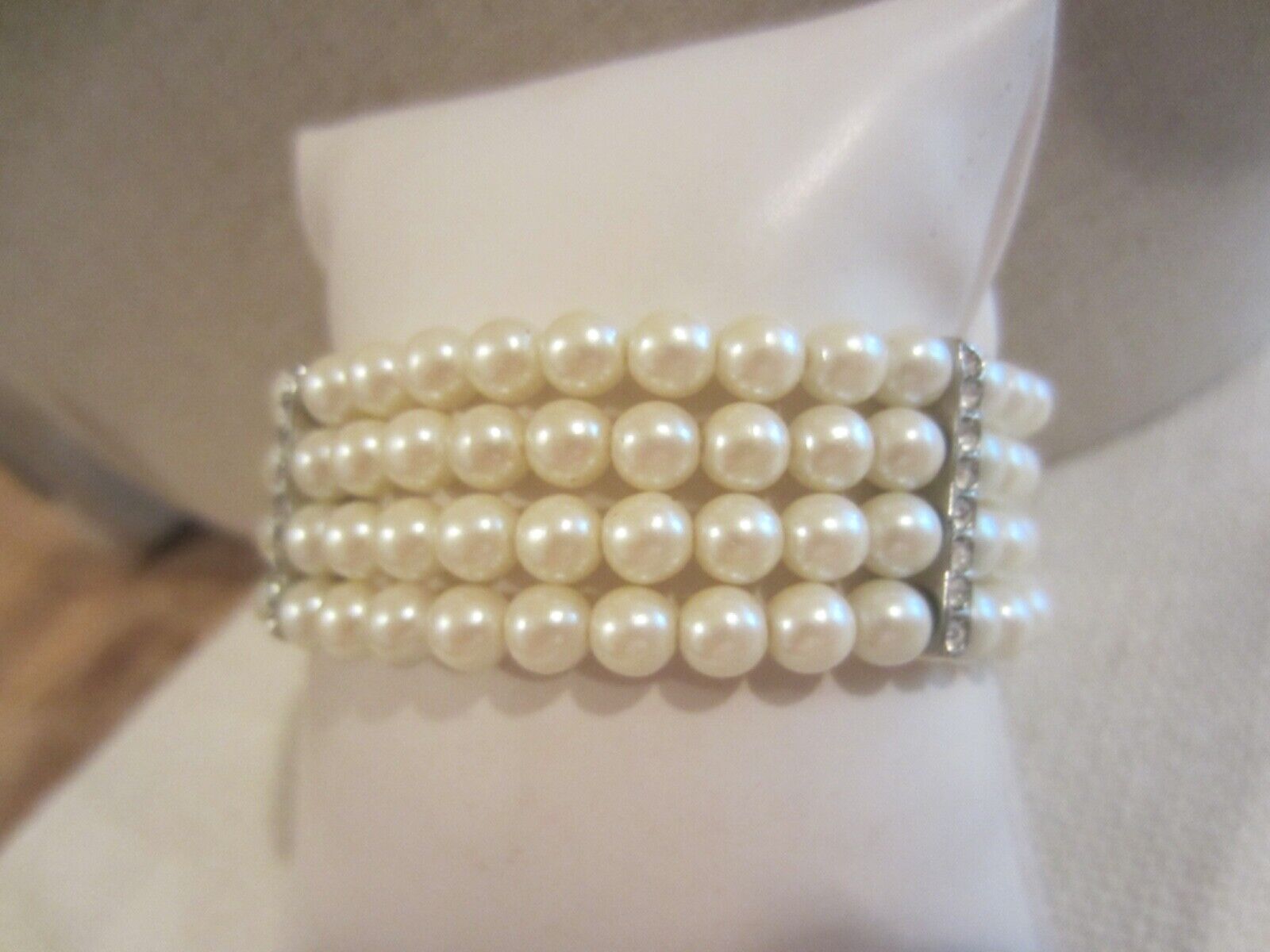 Vintage 4 strand pearl bracelet with rhinestones. 1900s Mid century