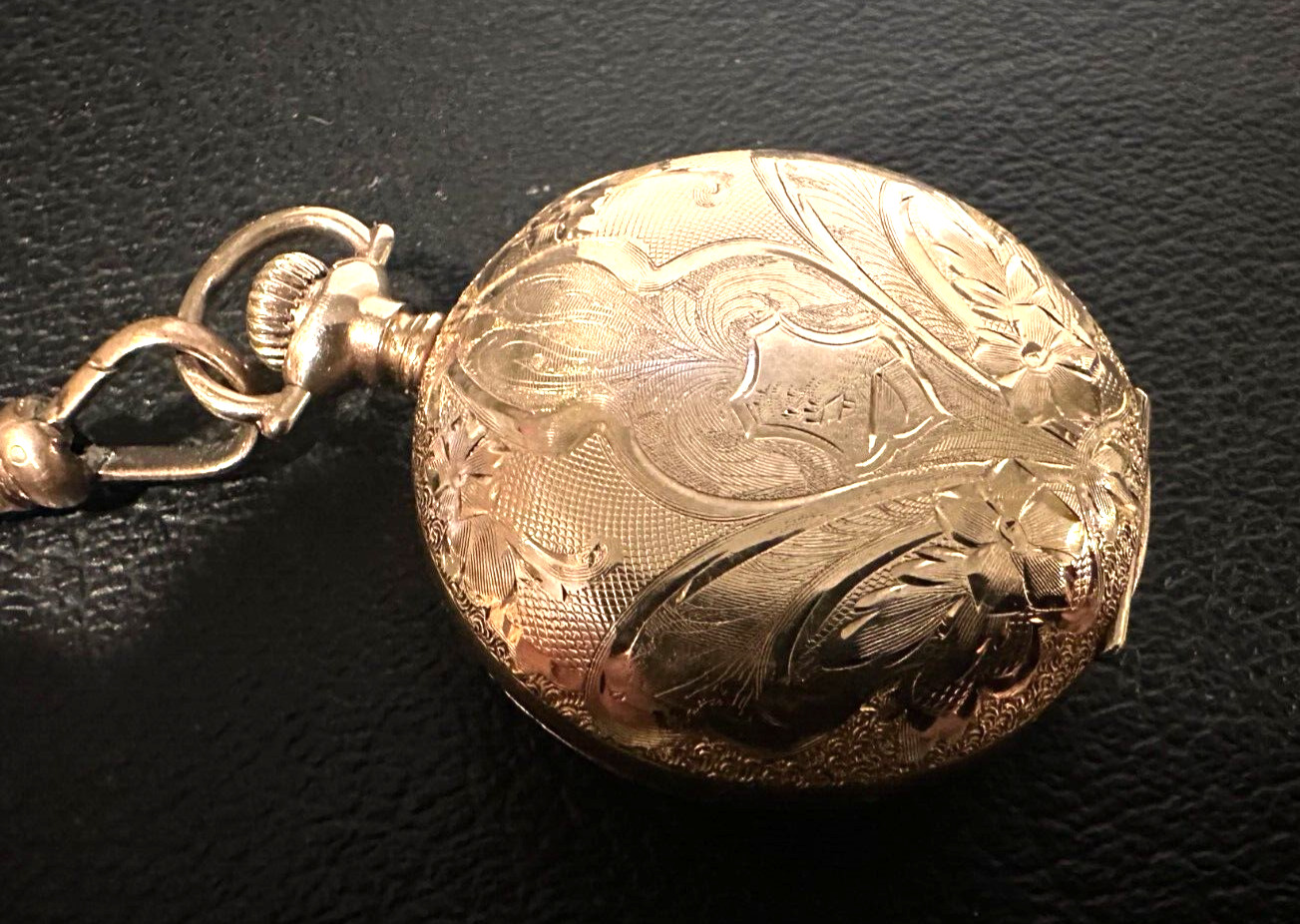 Gold filled Hunter Case size 0 Pocket watch late 1800s, with matching chain