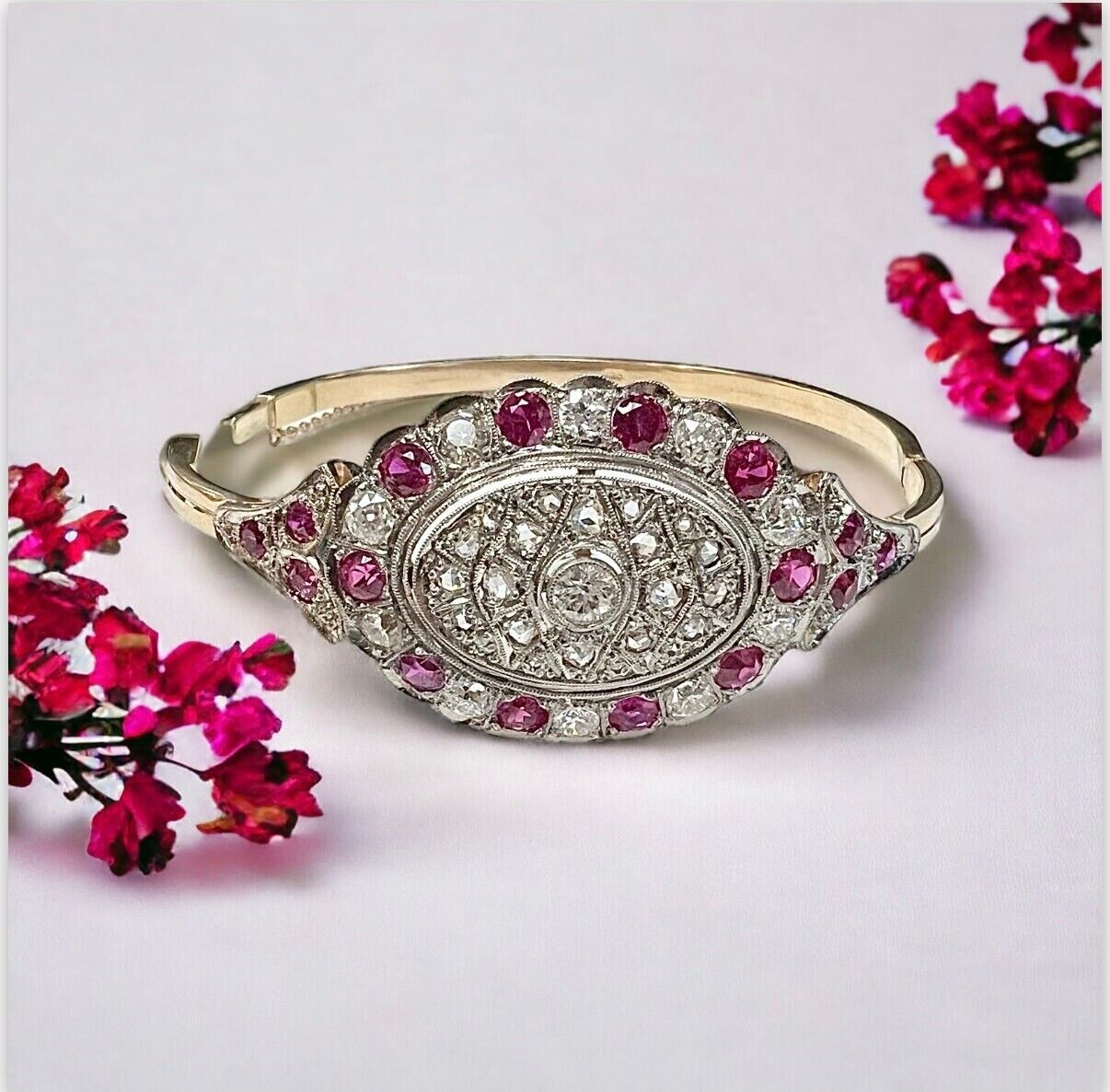 Victorian 1900s Bangle with Rubies and Diamonds in 14 karat yellow gold