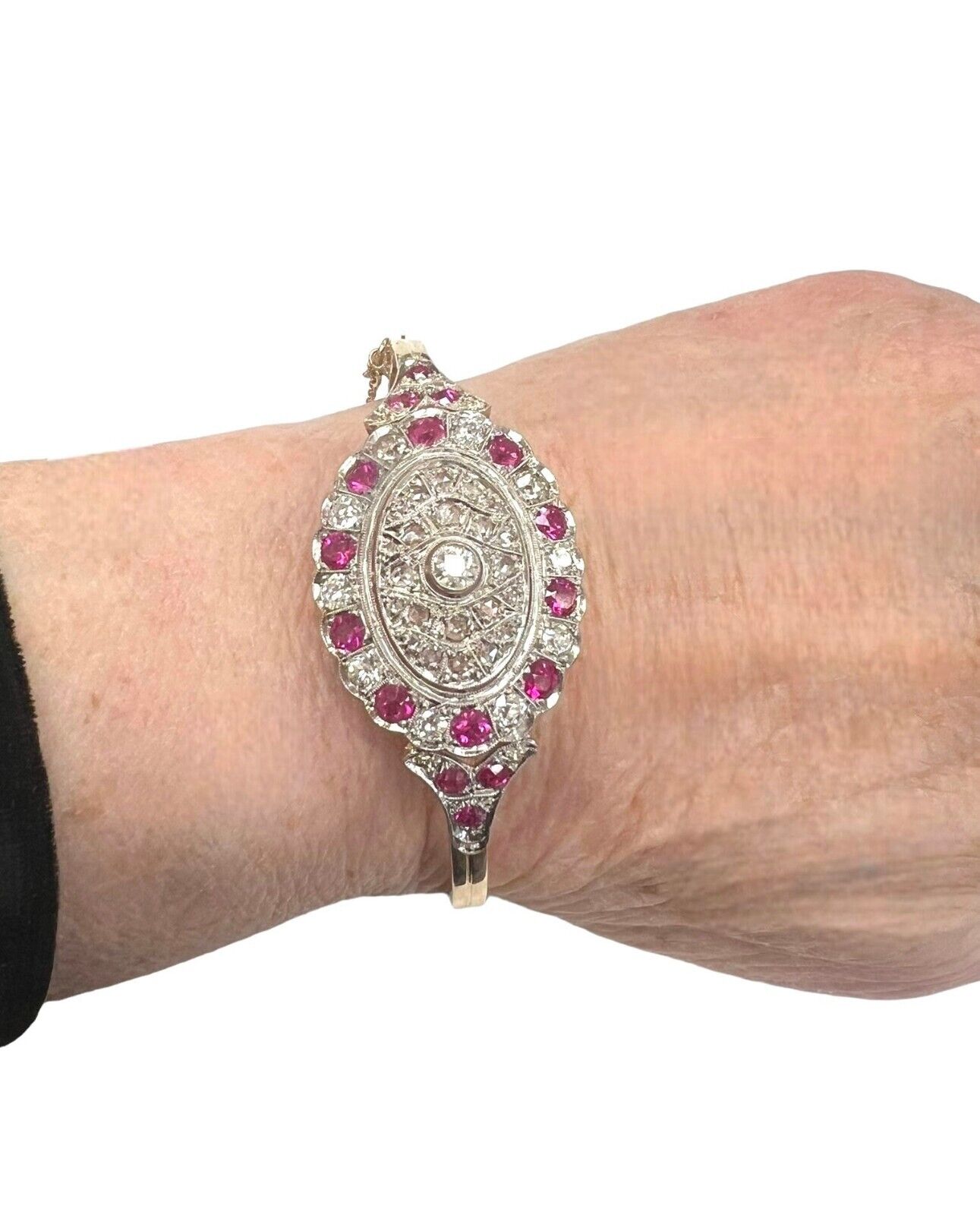 Victorian 1900s Bangle with Rubies and Diamonds in 14 karat yellow gold