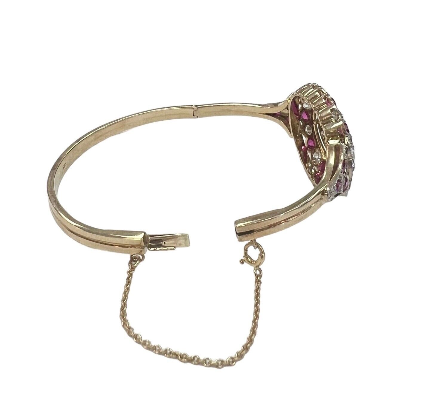 Victorian 1900s Bangle with Rubies and Diamonds in 14 karat yellow gold