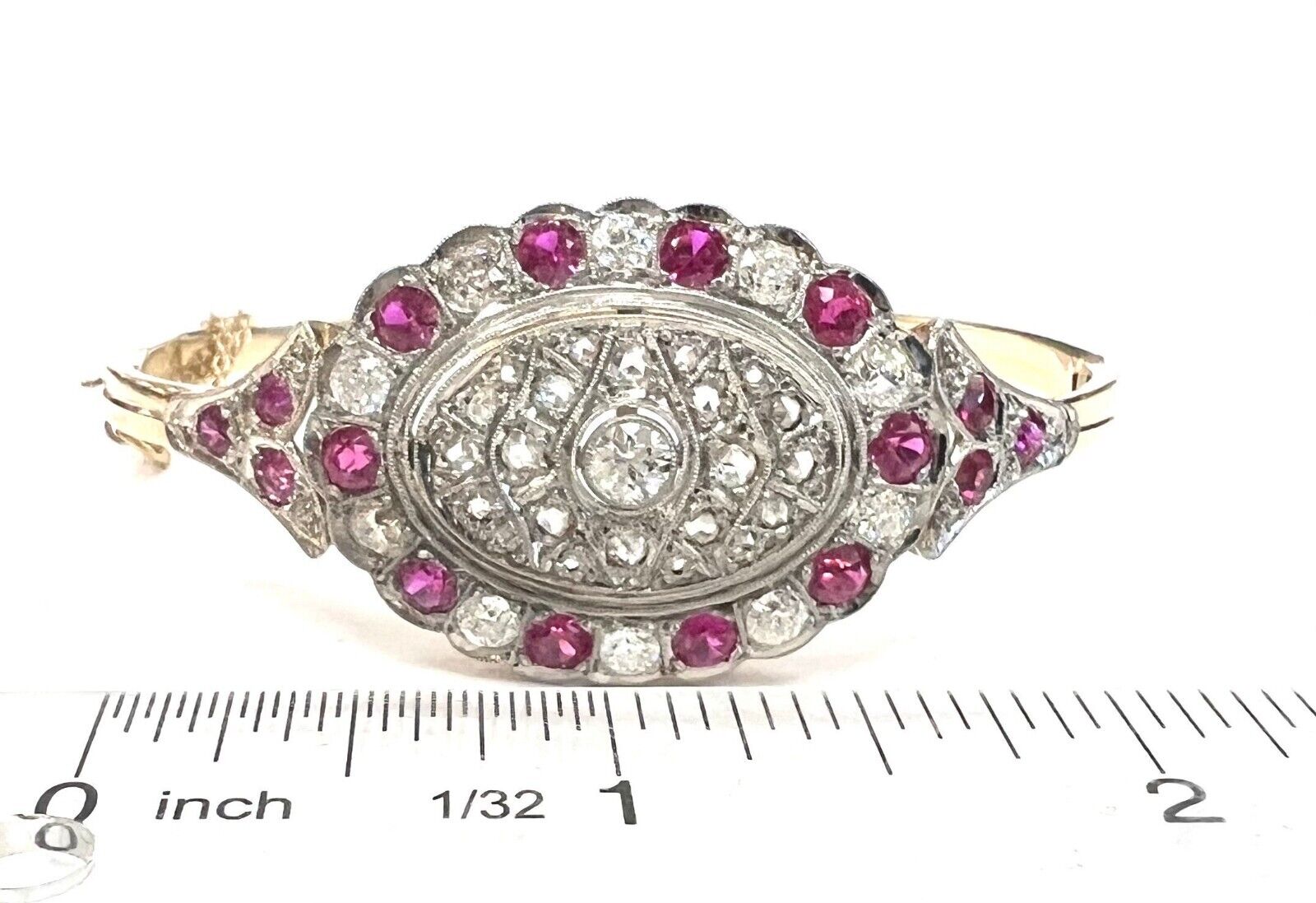 Victorian 1900s Bangle with Rubies and Diamonds in 14 karat yellow gold