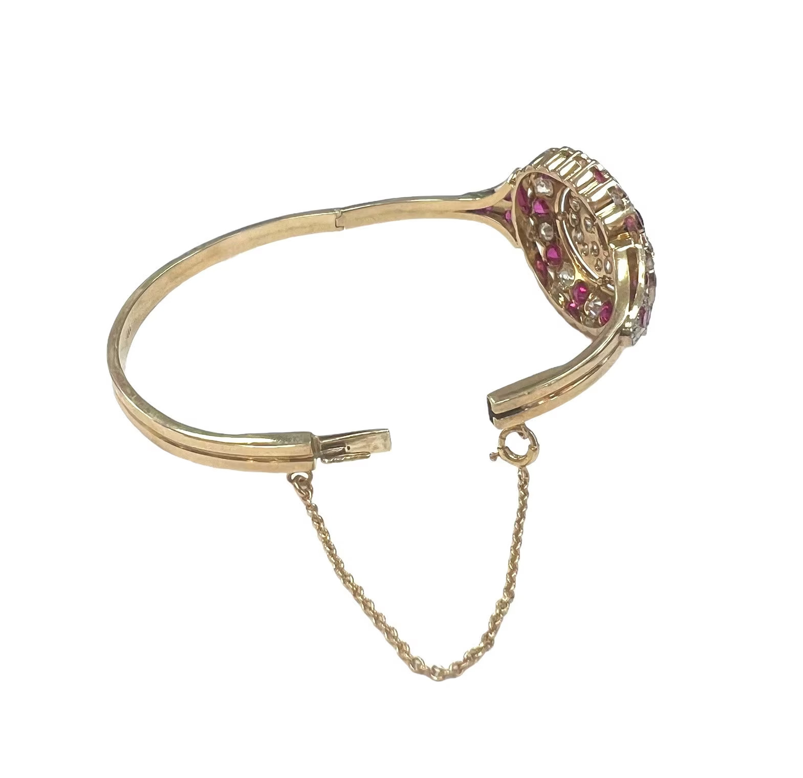 Victorian 1900s Bangle with Rubies and Diamonds in 14 karat yellow gold