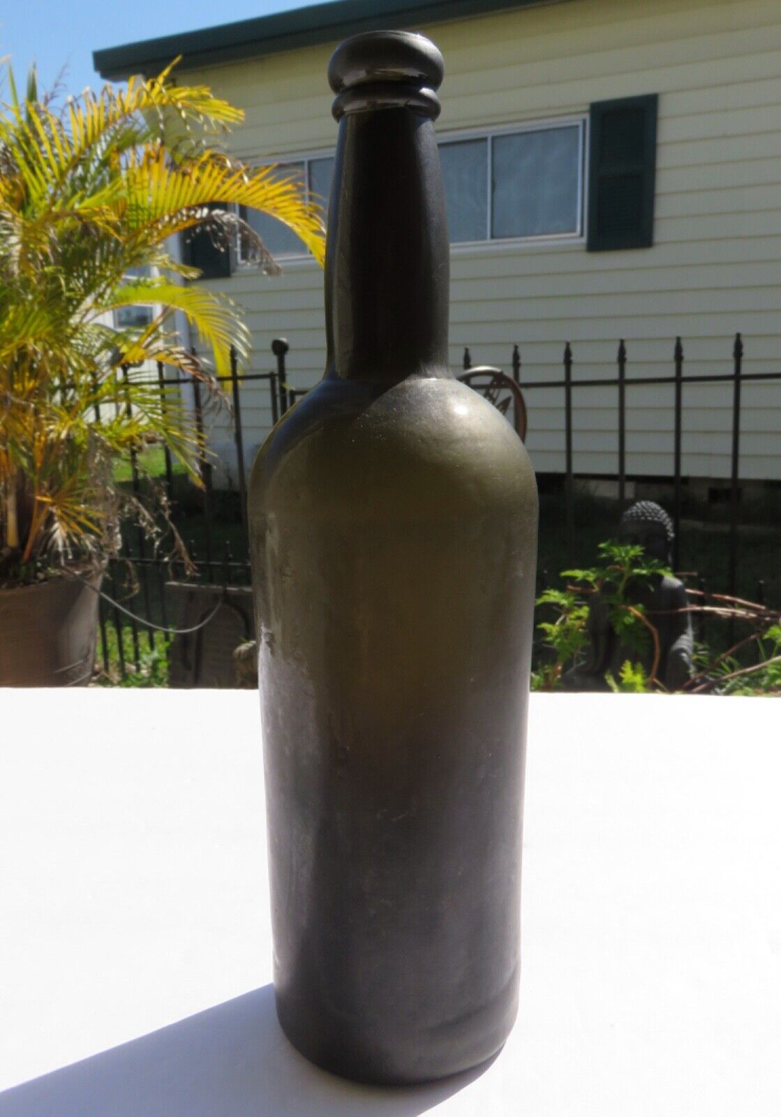 1800’s Dark Olive Green, 3 Seam, Applied Lip, 1.5” deep Bottom, 11.75” Bottle