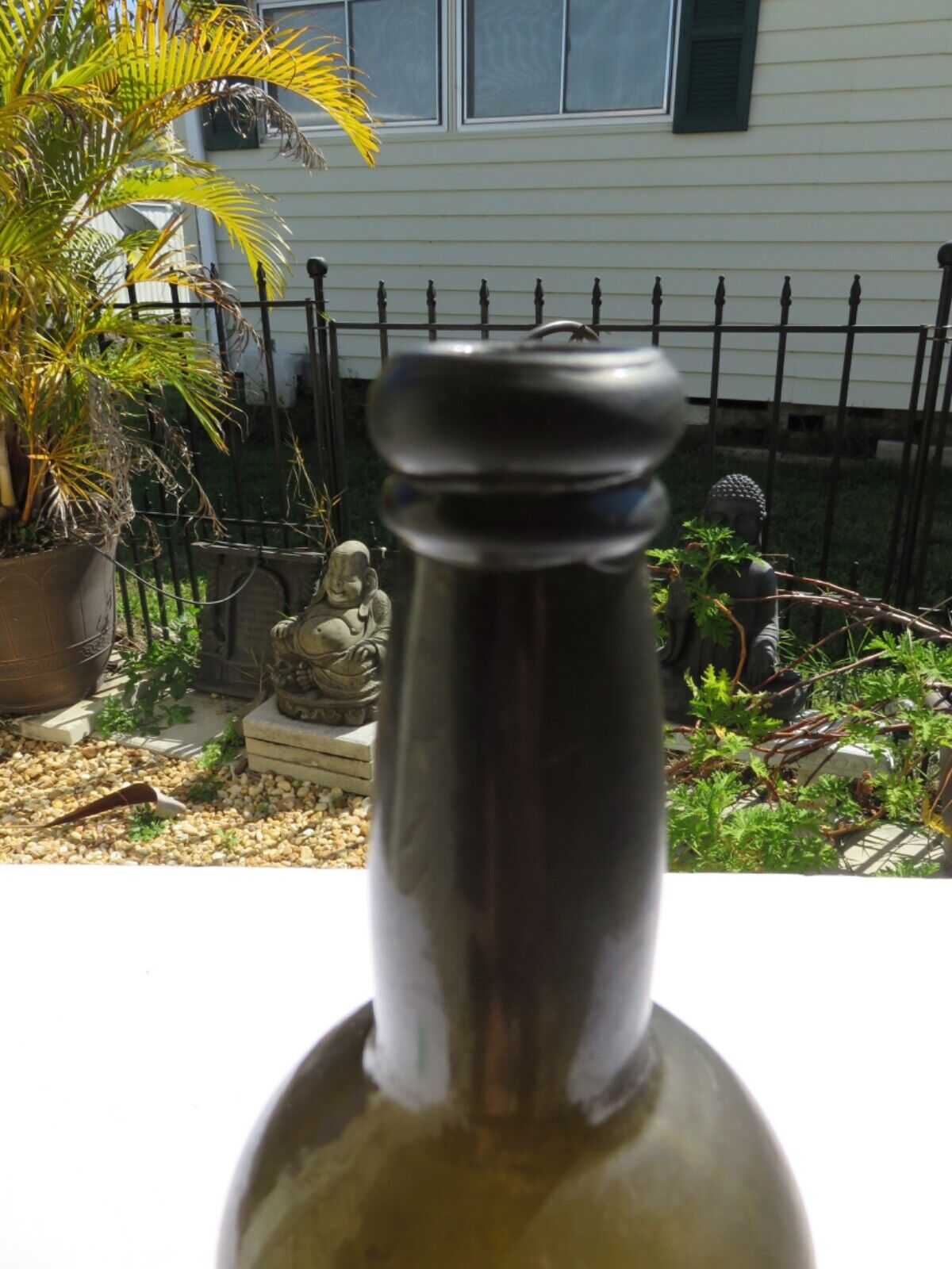 1800’s Dark Olive Green, 3 Seam, Applied Lip, 1.5” deep Bottom, 11.75” Bottle