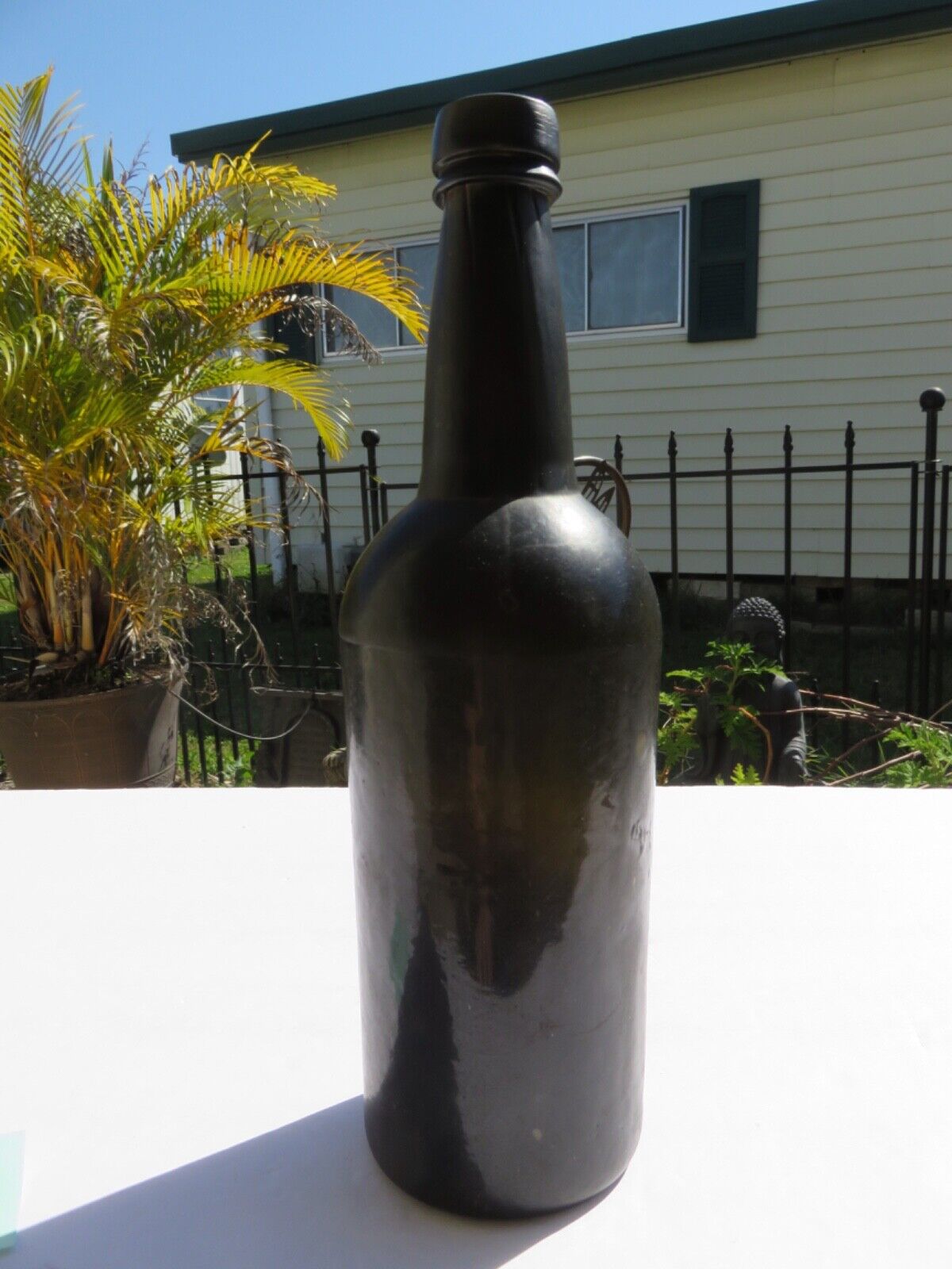 1800’s Dark Olive Green, 3 Seam, Applied Lip, 1.5” deep Bottom, 11” Bottle