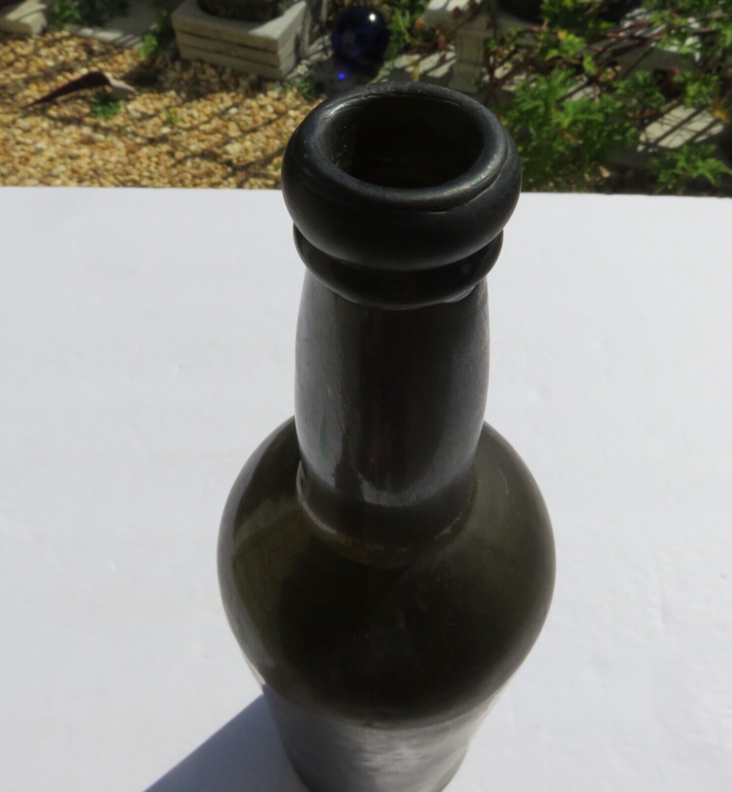 1800’s Dark Olive Green, 3 Seam, Applied Lip, 1.5” deep Bottom, 11.75” Bottle
