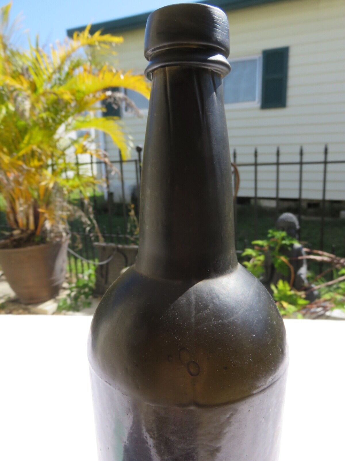 1800’s Dark Olive Green, 3 Seam, Applied Lip, 1.5” deep Bottom, 11” Bottle