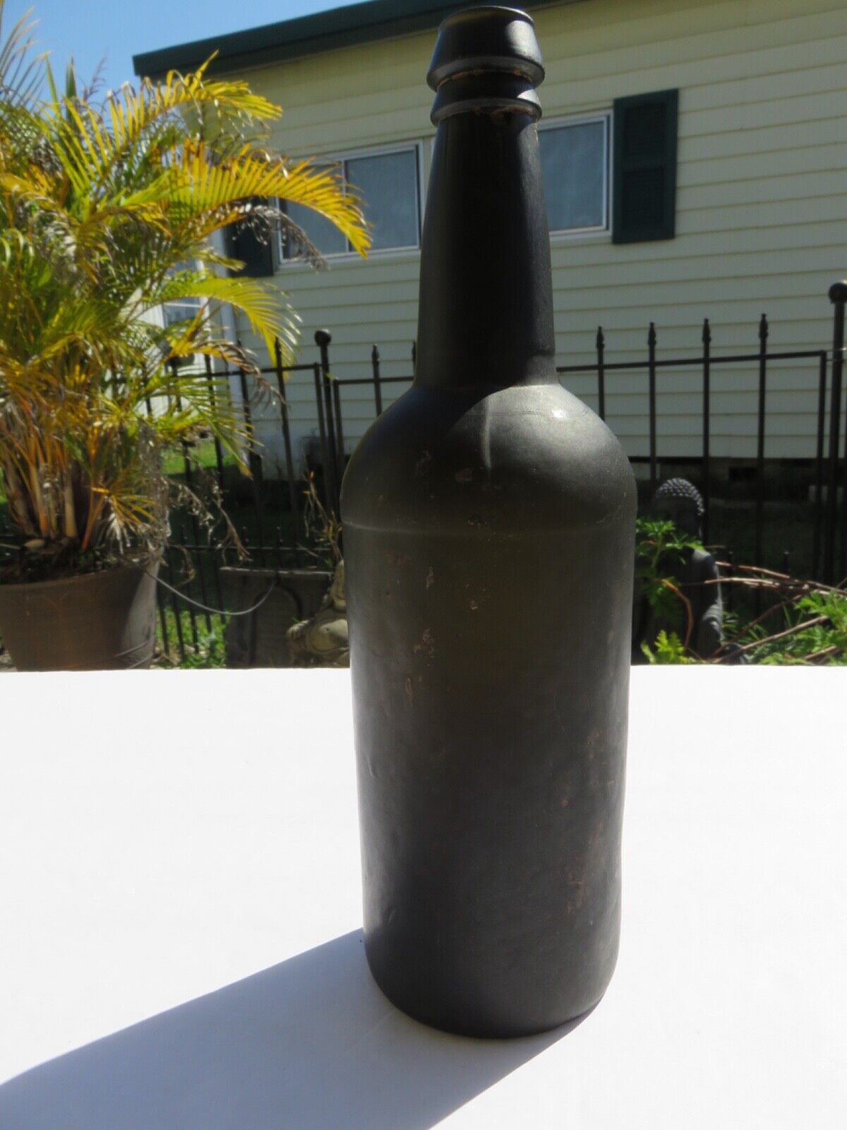 1800’s Dark Olive Green, 3 Seam, Applied Lip, 1.5” deep Bottom, 11” Bottle