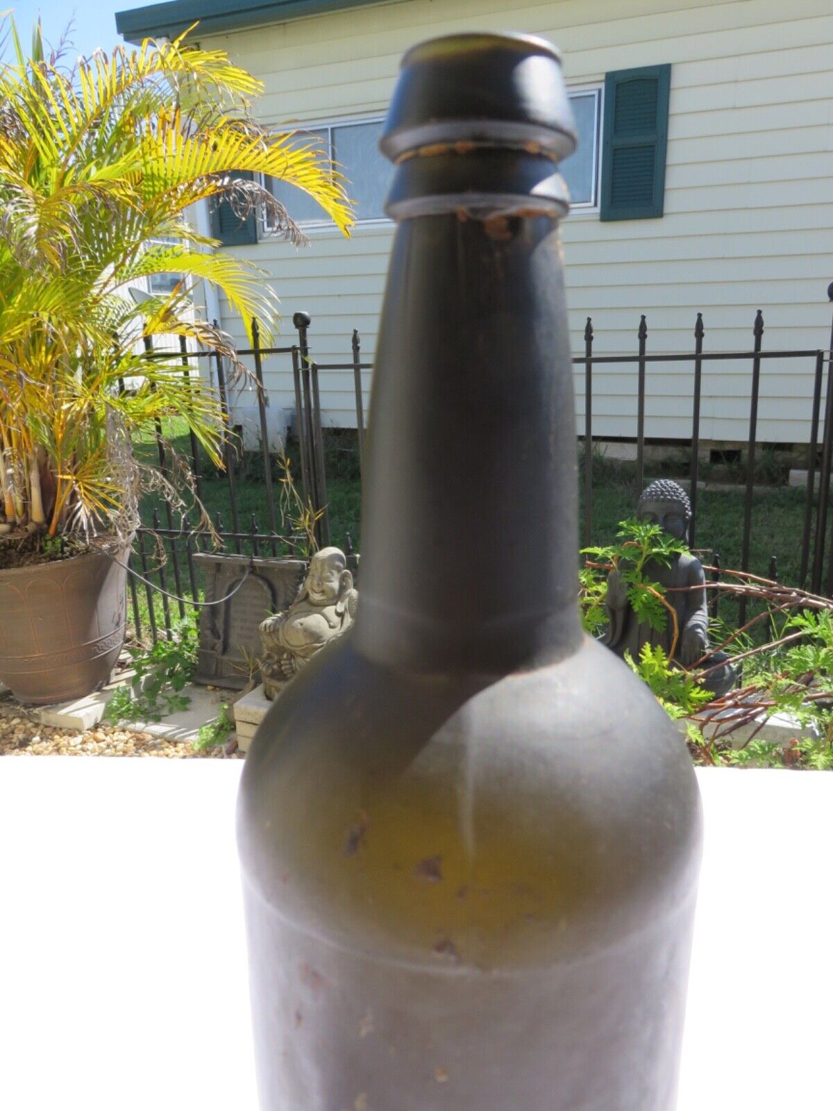 1800’s Dark Olive Green, 3 Seam, Applied Lip, 1.5” deep Bottom, 11” Bottle
