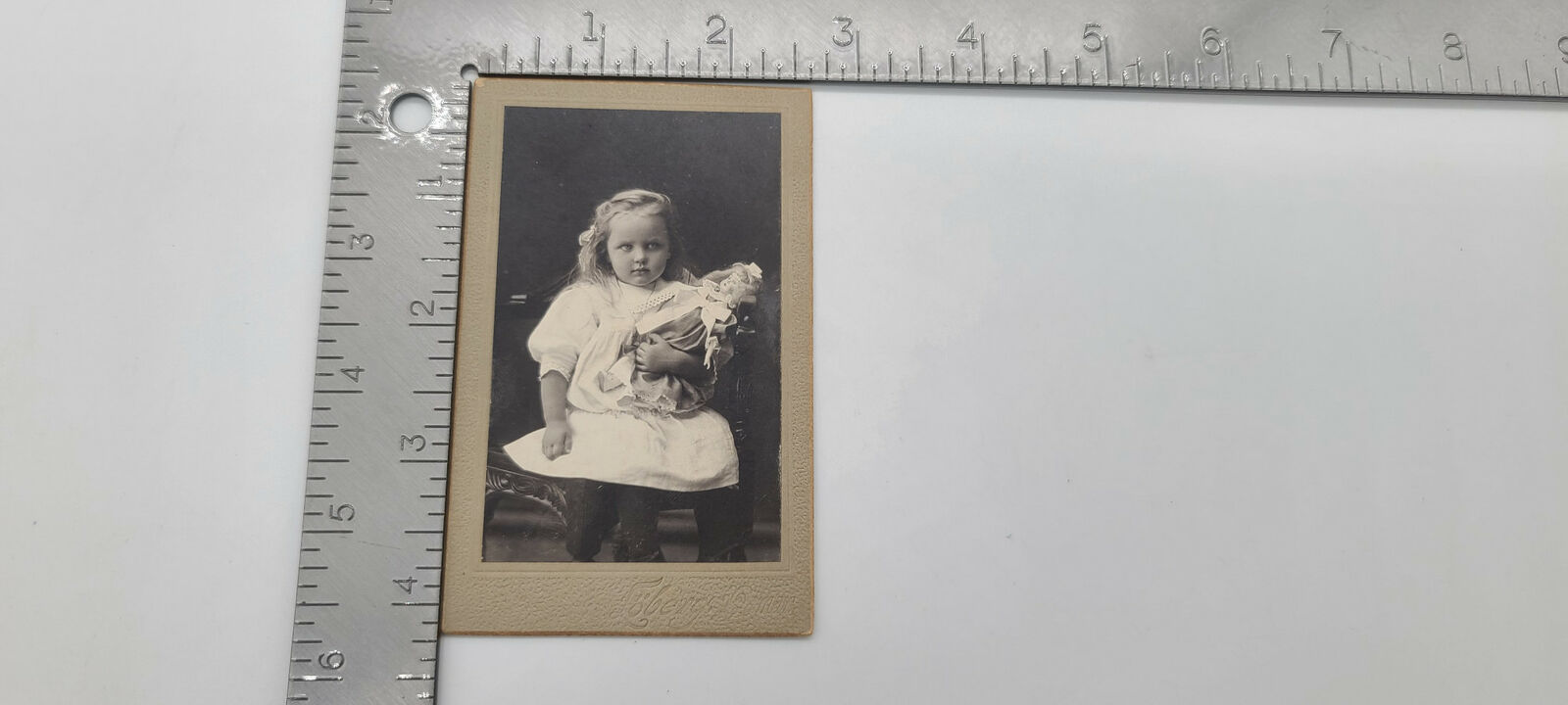 Creepy Cabinet Card: Little Girl with Doll 1900-1910
