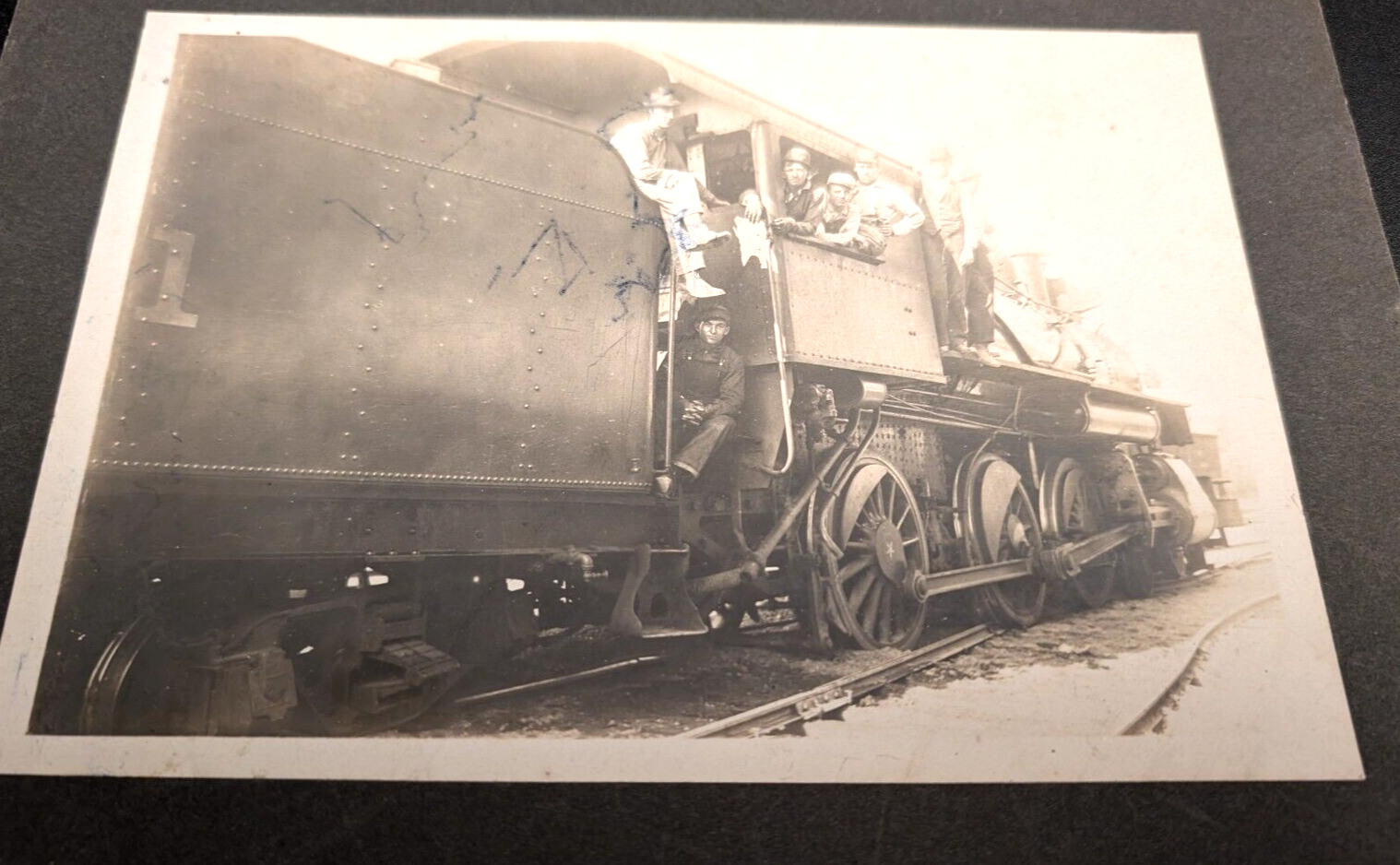 Stunning 1900's Photo "7 Railway Men pose on their train"