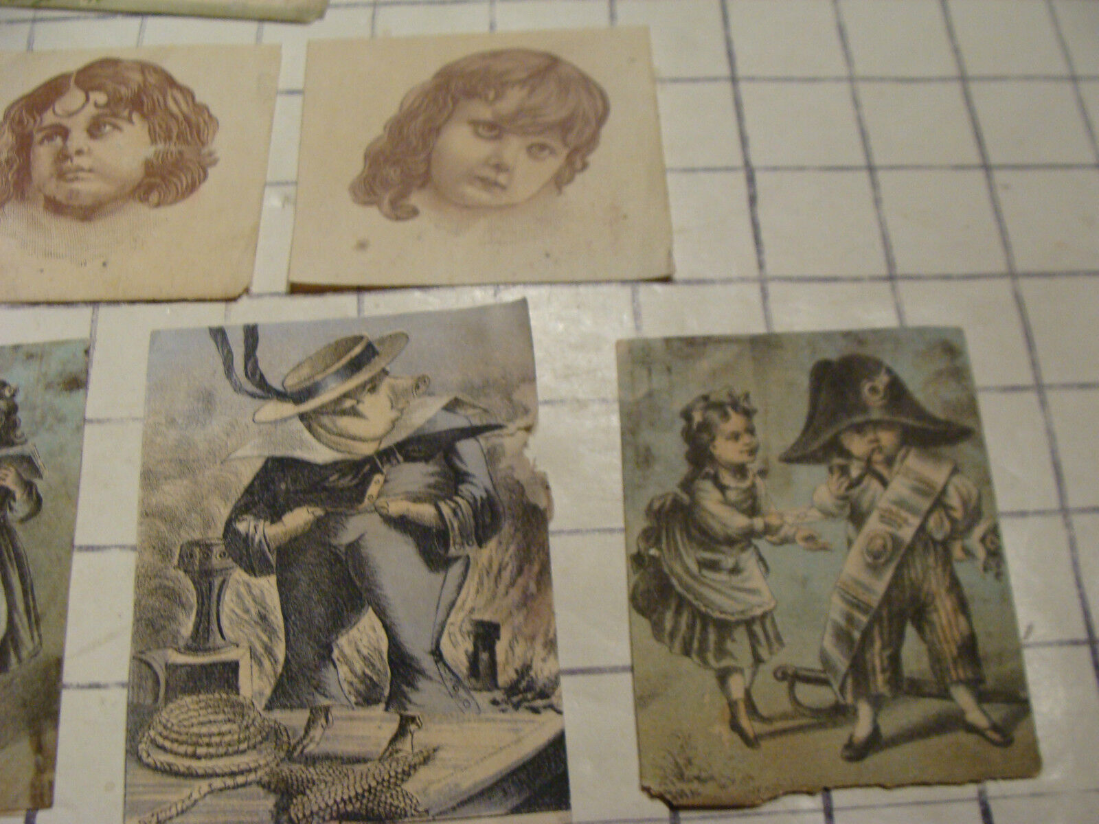 12 vintage 1800's misc papers, faces, trade cards, figures, card neat