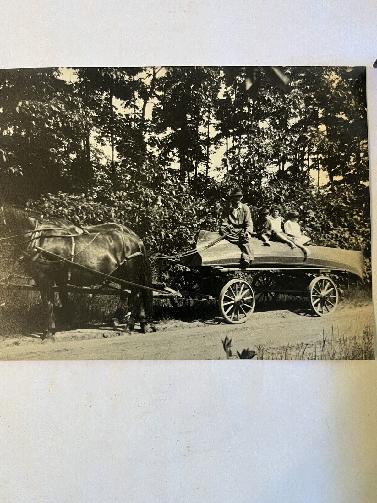 RARE 1900s COOL PHOTO of PEOPLE on BOAT BEING TOWED on WAGON PULLED BY HORSES 👀