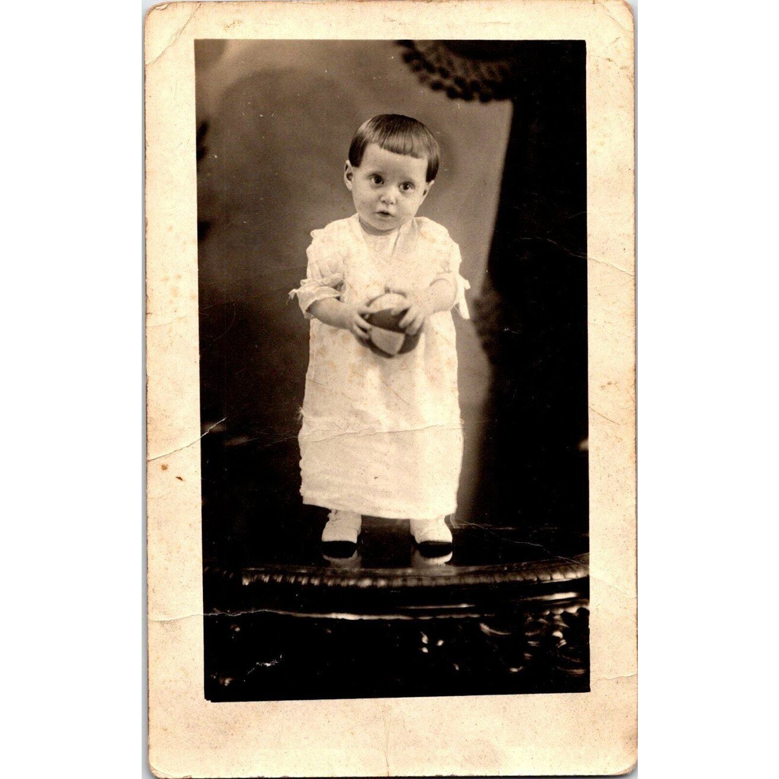 Vintage Postcard RPPC Toddler Adorable Child Holding Toy Ball Azo 1900s Photo