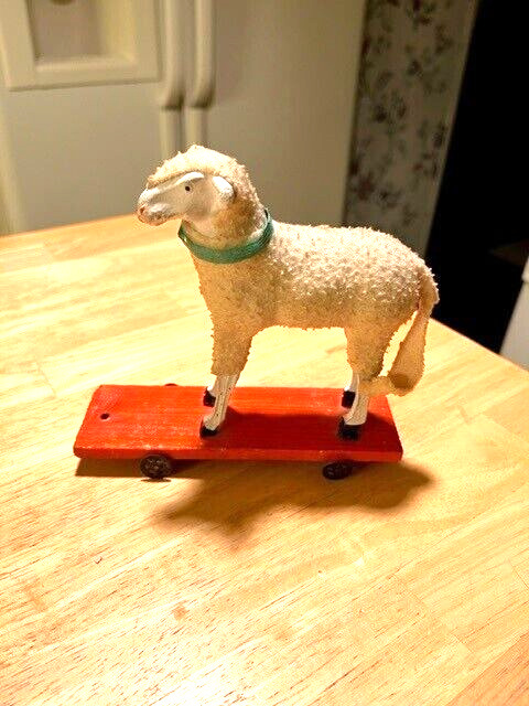 EARLY 1900S LARGE SIZE PUTZ SHEEP ON METAL WHEELS PULL TOY MADE IN GERMANY