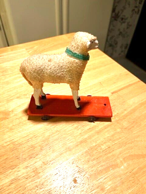 EARLY 1900S LARGE SIZE PUTZ SHEEP ON METAL WHEELS PULL TOY MADE IN GERMANY