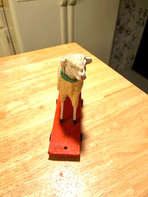 EARLY 1900S LARGE SIZE PUTZ SHEEP ON METAL WHEELS PULL TOY MADE IN GERMANY