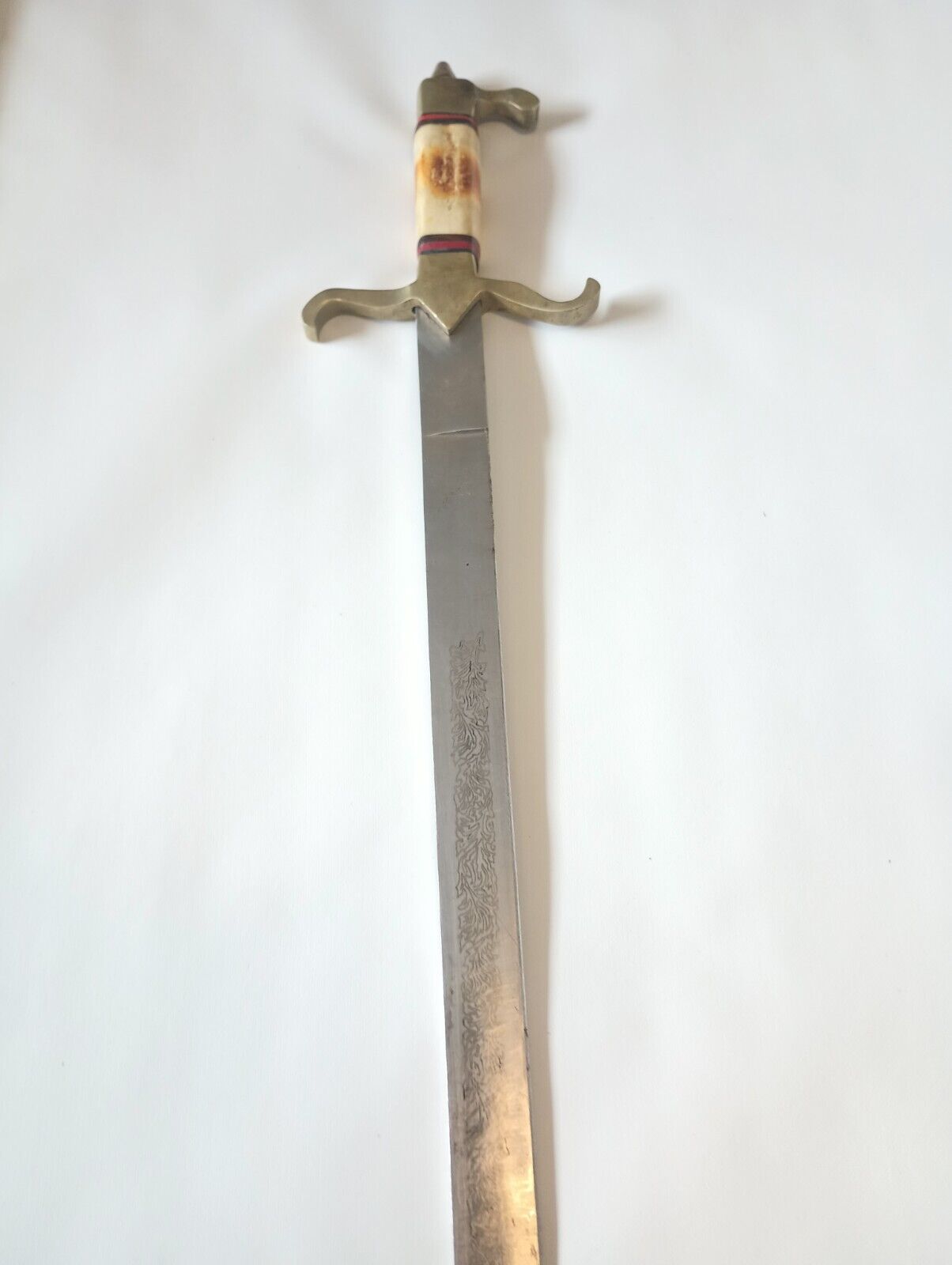 Antique Sword With Design On Blade