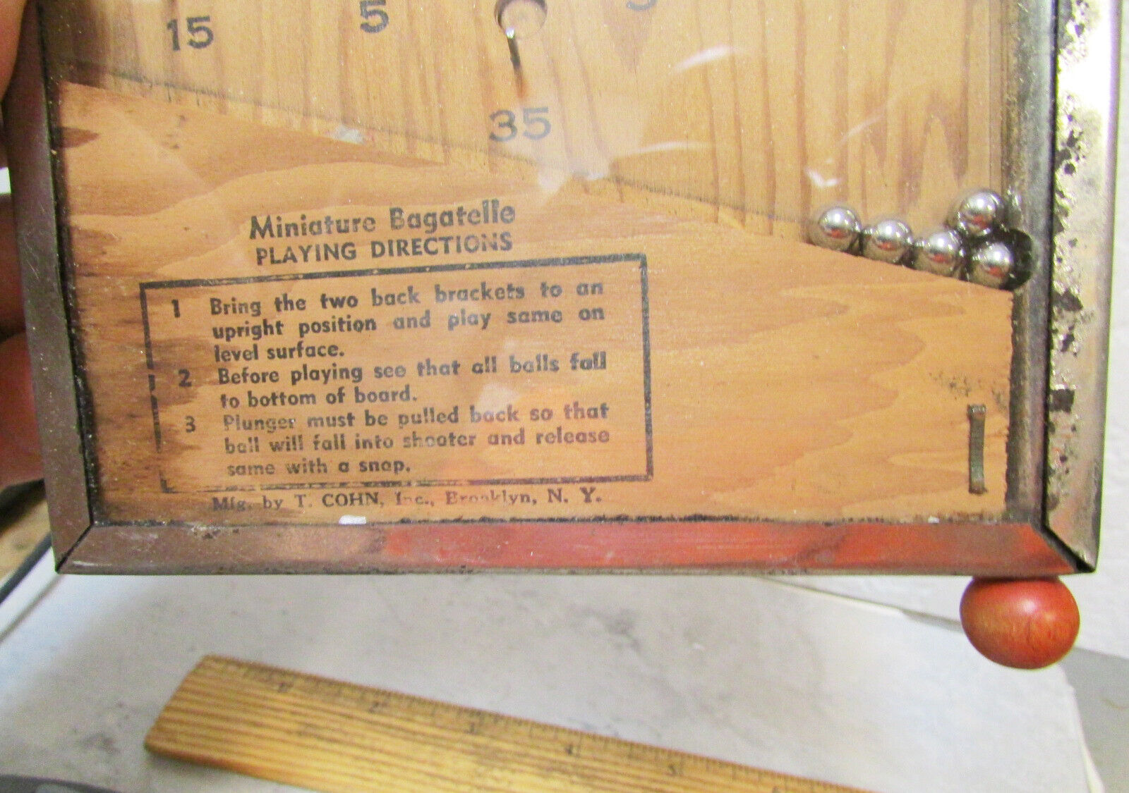 antique early 1900s Bagatelle hand held pinball game by T Cohn Brooklyn NY